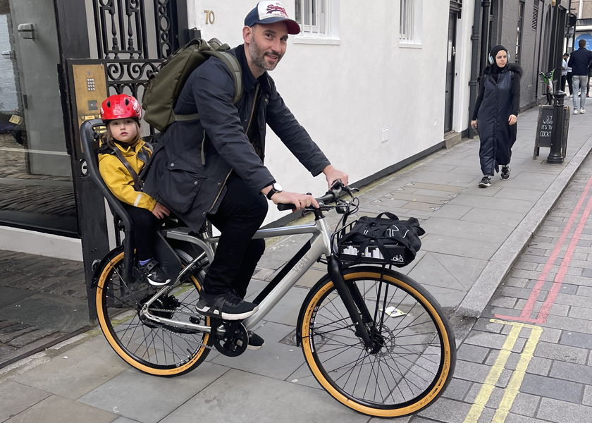 Dad with son in front of Volt Electric Bikes HQ with his new London E-bike